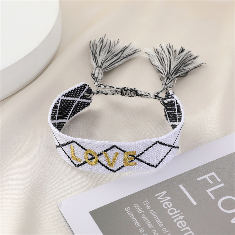 Ethnic Style Trend Hand-woven Bracelet Retro Embroidery Alphabet Tassel Hand Rope Bracelet display picture 7