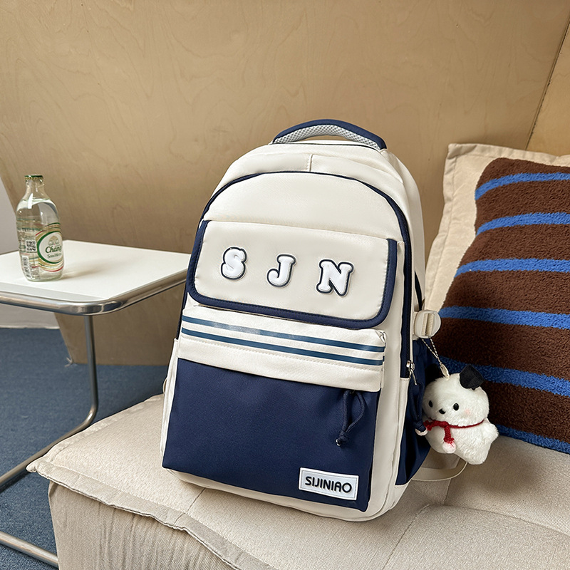 Nueva mochila escolar de gran capacidad, mochila de moda para estudiantes de secundaria coreana, mochila de pareja de estudiantes universitarios de estilo universitario de todo fósforo