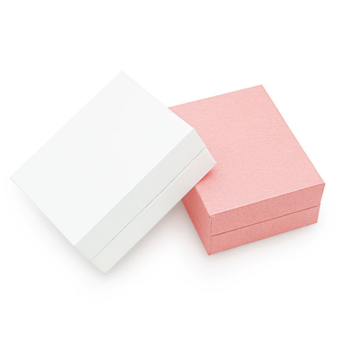 Packaged gift box for six rose quartz jewelry, with colored bow and black and white storage box for accessories