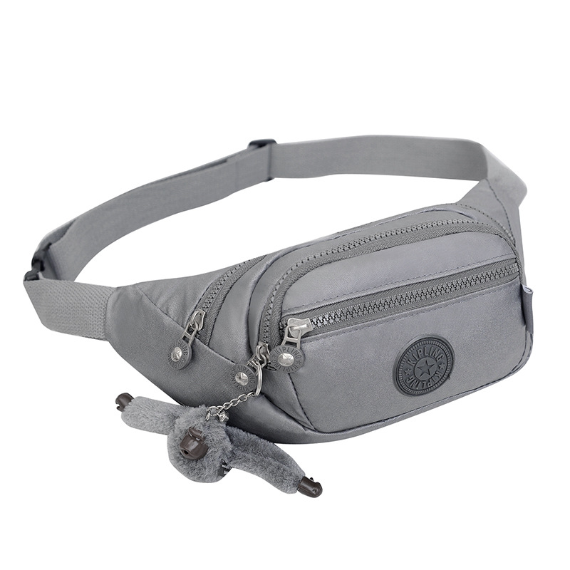 2023 nuevo bolso de pecho bolso crossbody bolso de hombro de tela impermeable brillante pequeño mono colgante de compras bolso de pecho Live Streaming drenaje