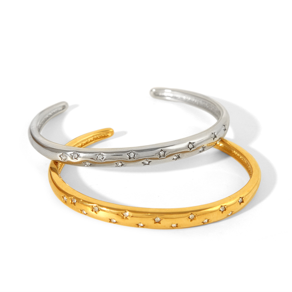 Venta caliente pulsera abierta todo-fósforo joyería 18K galvanoplastia Fundición de acero de titanio de la vendimia estrellada circón ocho Awn estrella transfronteriza