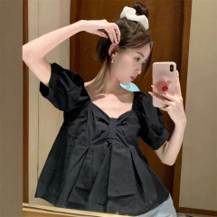 外国貿易の泡の袖のシャツの女性の半袖の夏の韓国版の白いは腹を遮ってやせている短いタイプの方襟の純色の上着の女性を現します。