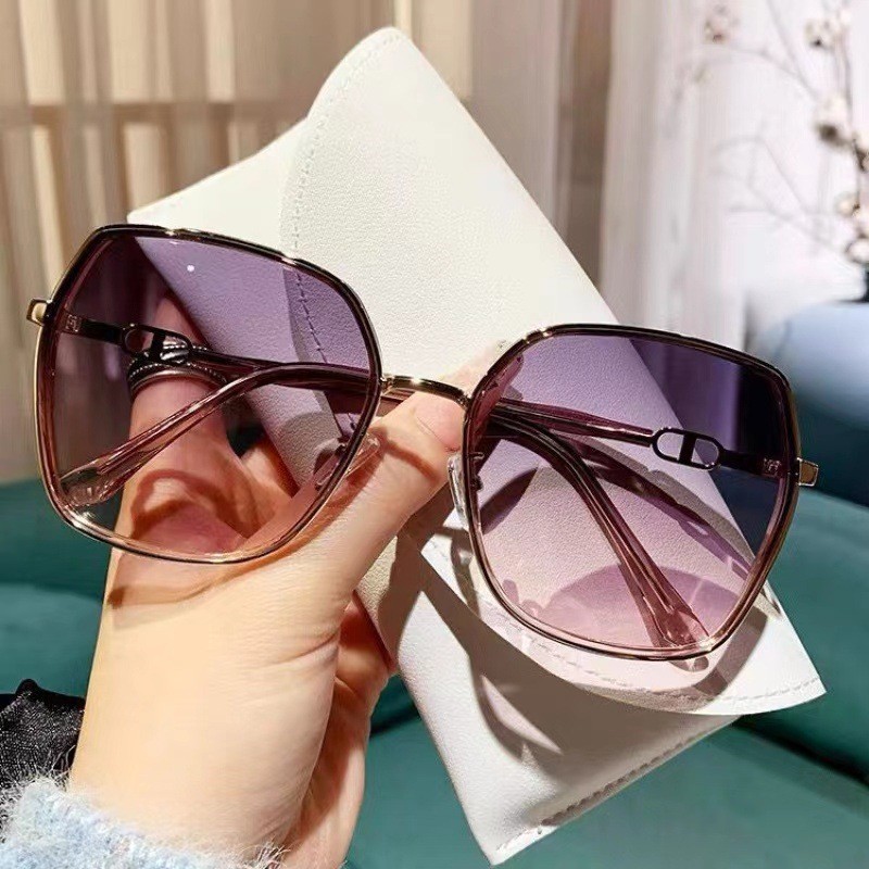 Nuevas gafas de sol de borde rosa brillante para mujeres sensación de alta calidad Street Shoot mode cóncavo anti-UV gafas de sol sensación de alta calidad