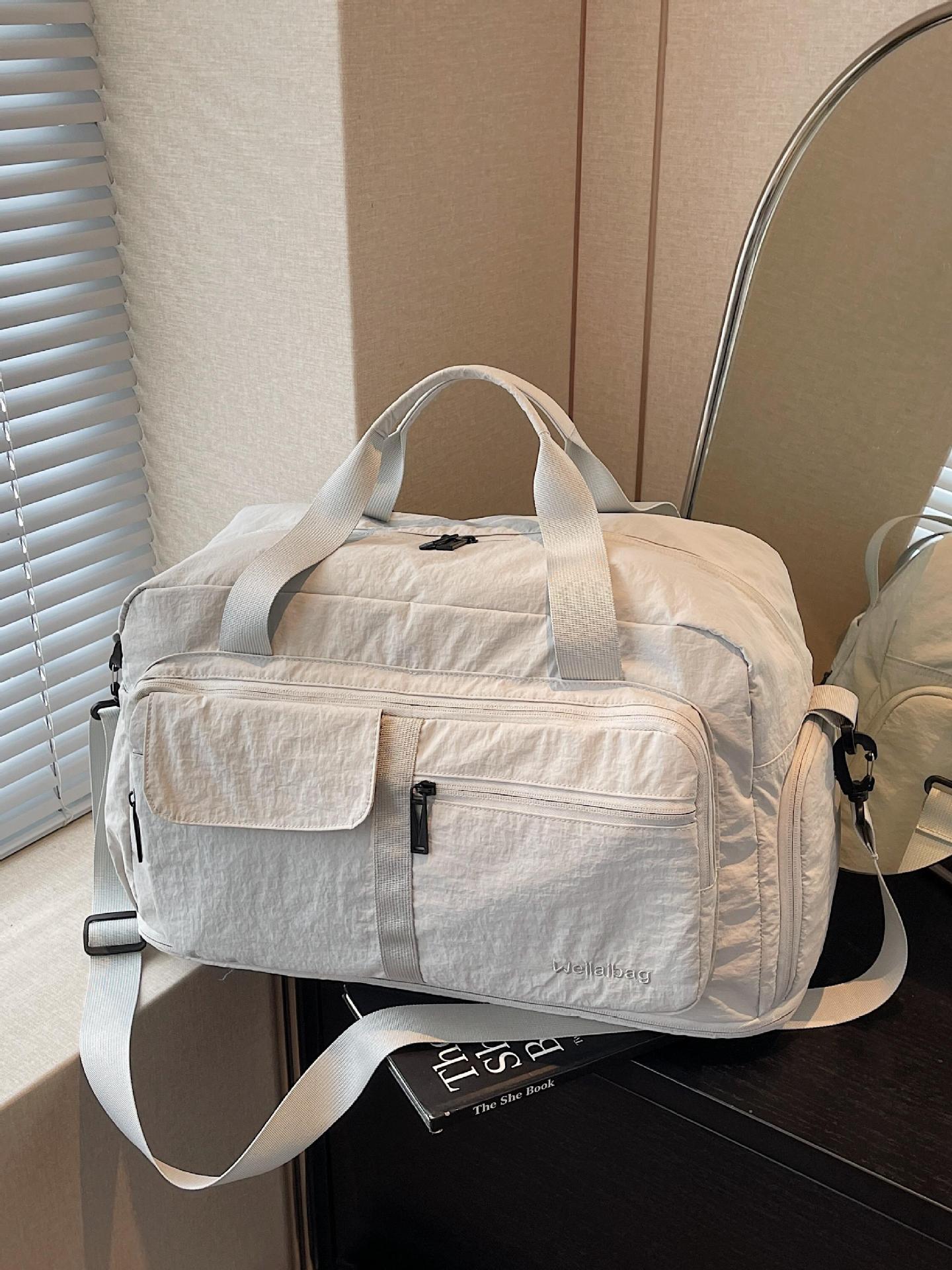 Bolsa de viaje de corta distancia portátil transfronteriza nueva bolsa de almacenamiento portátil de gran capacidad bolsa de yoga de fitness al aire libre bolsa de lona mujer