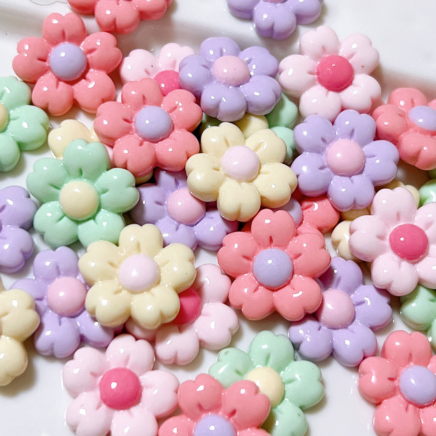 Accesorios de joyería de resina DIY caliente al por mayor brillante flor de cerezo jalea color accesorios para el cabello hecho a mano crema pegamento materiales hechos a mano