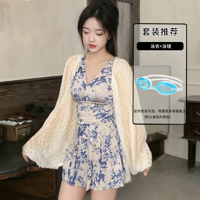 2025 nuevo estilo de manga larga protector solar falda de una pieza traje de baño con blusa de vacaciones de aguas termales traje de baño de alta gama mujeres al por mayor