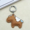 Brown-colored horse with oil edges + silver spring coil