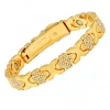 Golden bracelet heart shaped, four-leaf clover