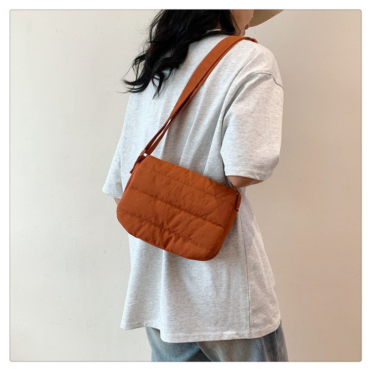 Daily casual simple small square bag Korean spring lightweight personality design popular shoulder crossbody horizontal small square bag_voghion.com