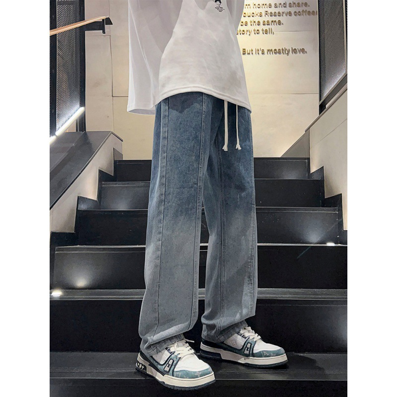 Una marca de moda de Hong Kong jeans para hombres otoño y invierno nuevos pantalones de pierna ancha gradiente al por mayor jeans para hombres