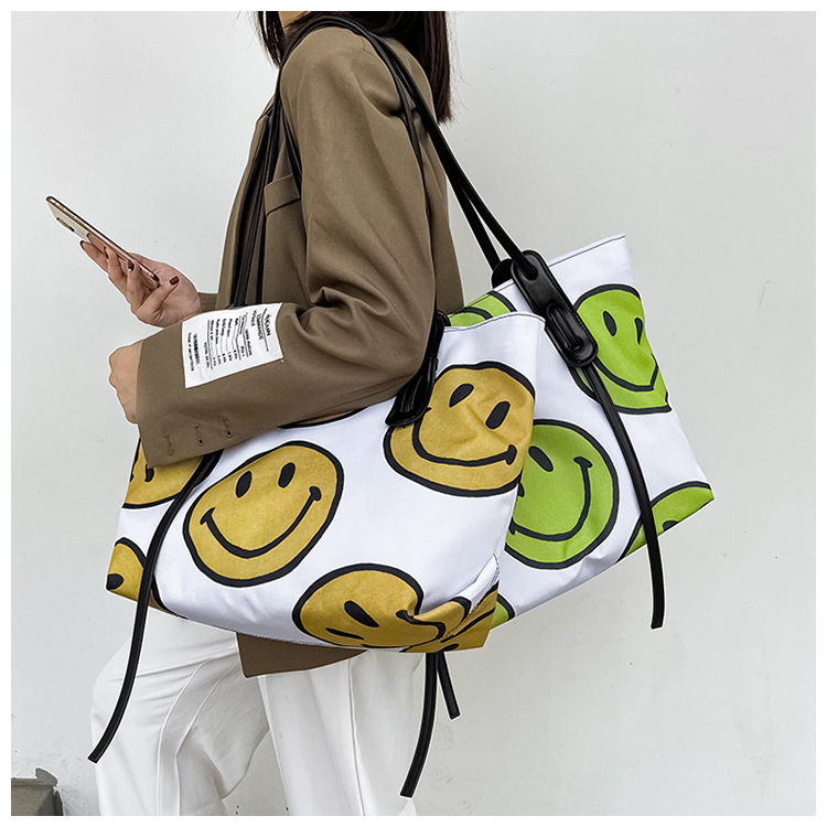 Korean Dongdaemun New Cute Fashion Smiley Canvas Women's Bag Printed Canvas Portable Shoulder Bag Large Tote Bag display picture 3