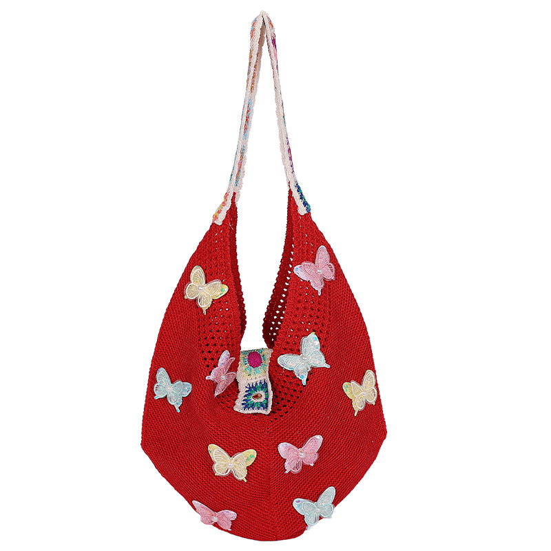 Versión coreana del bolso de nicho 2025 verano nuevo bolso femenino mariposa bolso tejido bolso de hombro de punto de gran capacidad
