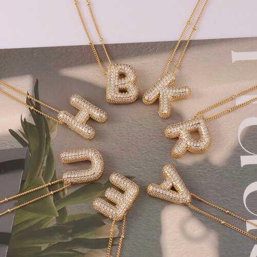 Hot-selling gold-plated copper bracelet with zirconia balloon bubble pendant, featuring 26 English letters.