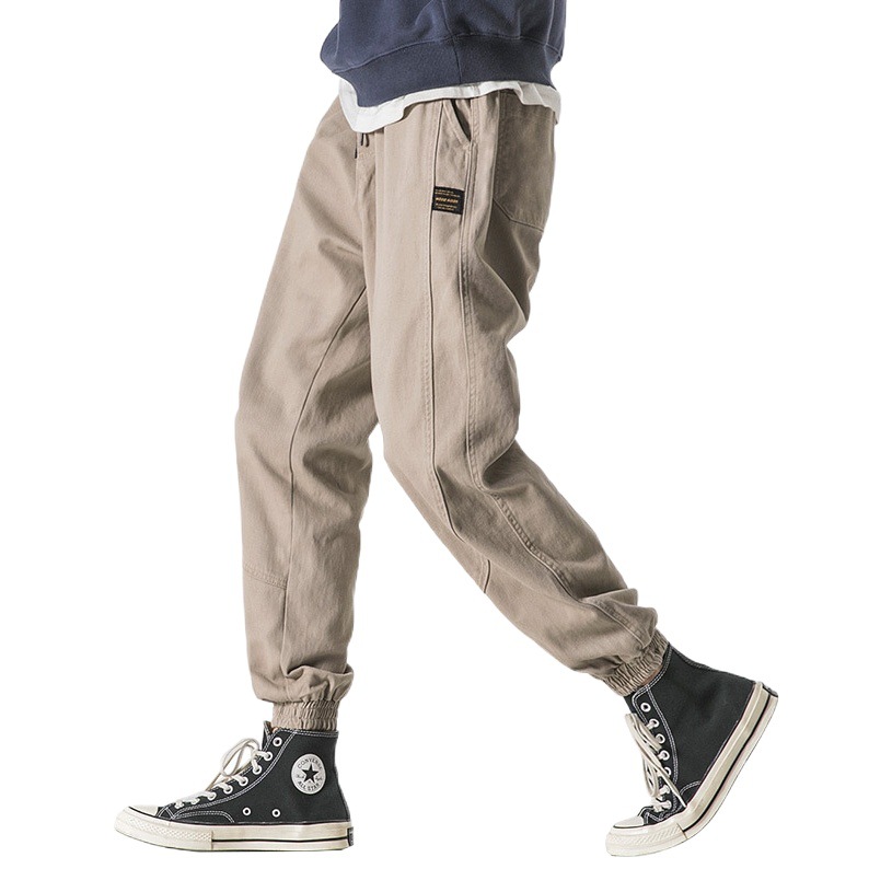 Monos de marca de moda Primavera y otoño de los hombres nuevos pantalones casuales atados al tobillo estilo coreano sueltos Pantalones deportivos flacos de moda para todos los partidos