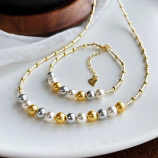 Beautiful Artificial Crystal Pearl Set in Gold and White, Featuring a Unique Mixed-Color Design, Niche Fashion New Arrival
