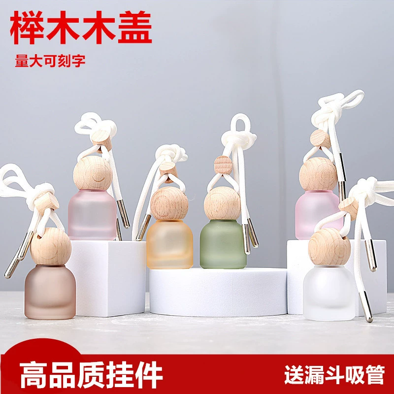 Цветной автомобильный ароматизатор-кулон G010-10 мл, цилиндрической формы, с фиксированным логотипом.