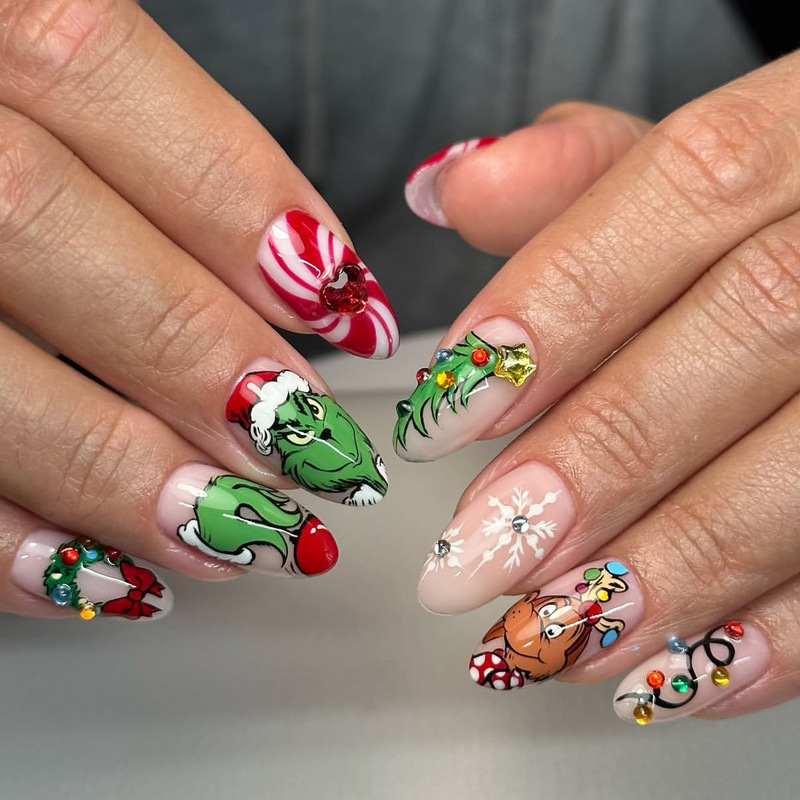 24 pieces of almond-shaped, European and American-style Christmas-themed green and red Grinch cartoon candy-colored fake nails, featuring a green and red color contrast 24 pieces of almond-shaped, European and American-style Christmas-themed green and red Grinch cartoon candy-colored fake nails, featuring a green and red color contrast