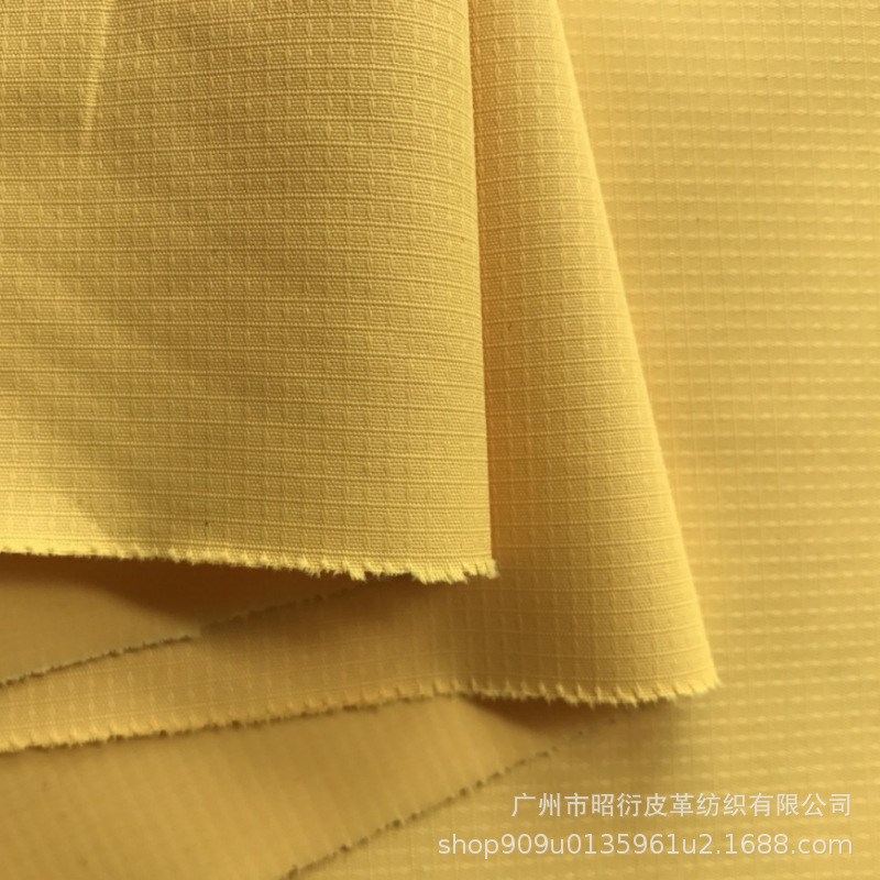 涤纶格中点过胶 棉衣风衣 羽绒服面料批发