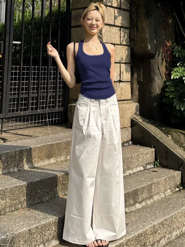 帆泰に頼ってレモンの黄色を修理して首のガーターのベストの女性の少女を掛けます。|undefined