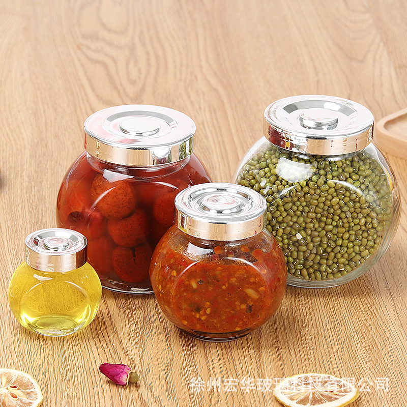 厂家批发透明玻璃扁鼓瓶杂粮储藏罐厨房防潮密封调味瓶玻璃糖果罐