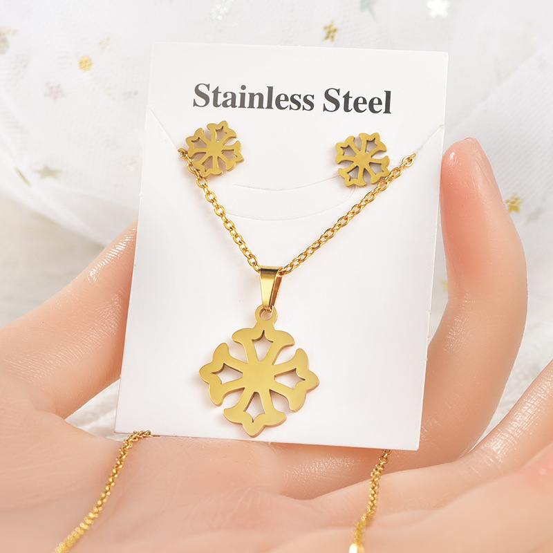 Traje de acero de titanio europeo y americano transfronterizo colgante de copo de nieve pendientes unisex accesorios de joyería geométrica Comercio exterior conjunto de dos piezas