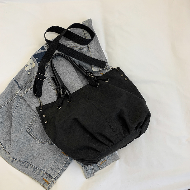 Este año popular universal nicho japonés VW lienzo de gran capacidad 2024 estilo de estilo occidental retro portátil clase de viaje mochila