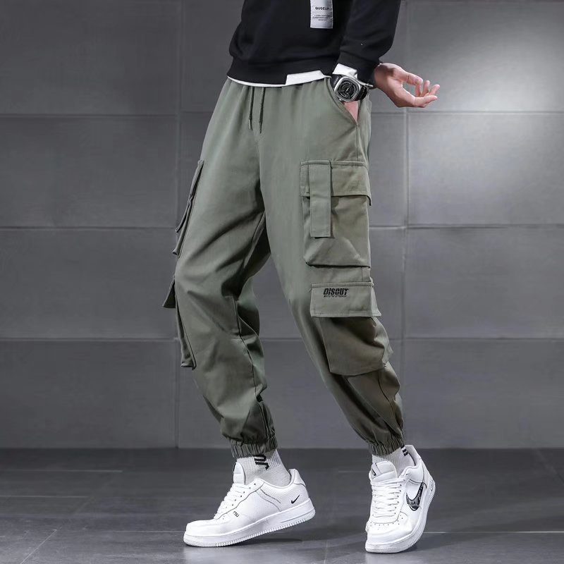 Pantalones de los hombres de marca de moda de otoño e invierno más tamaño pantalones casuales de los hombres forrados de lana estilo coreano ropa de trabajo suelta pantalones de trabajo al aire libre