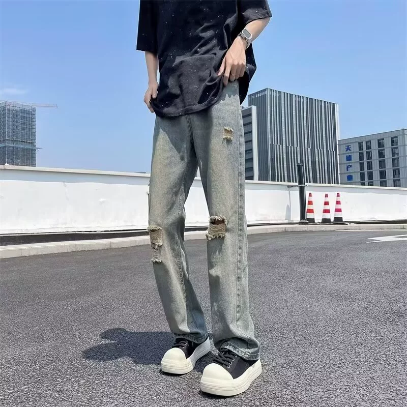 Американские весенне-осенние широкие джинсы в стиле ретро, ​​новые мужские свободные и универсальные повседневные прямые брюки с рваным дизайном
