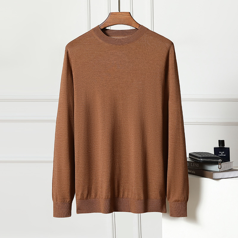 Autumn woolen solid sweater with a round collar