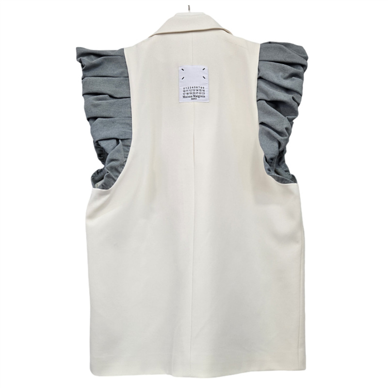 Estación europea de moda chaleco de mujer 2025 otoño y invierno nuevo color contraste manga plegada empalmado chaqueta vaquín cuello delgada