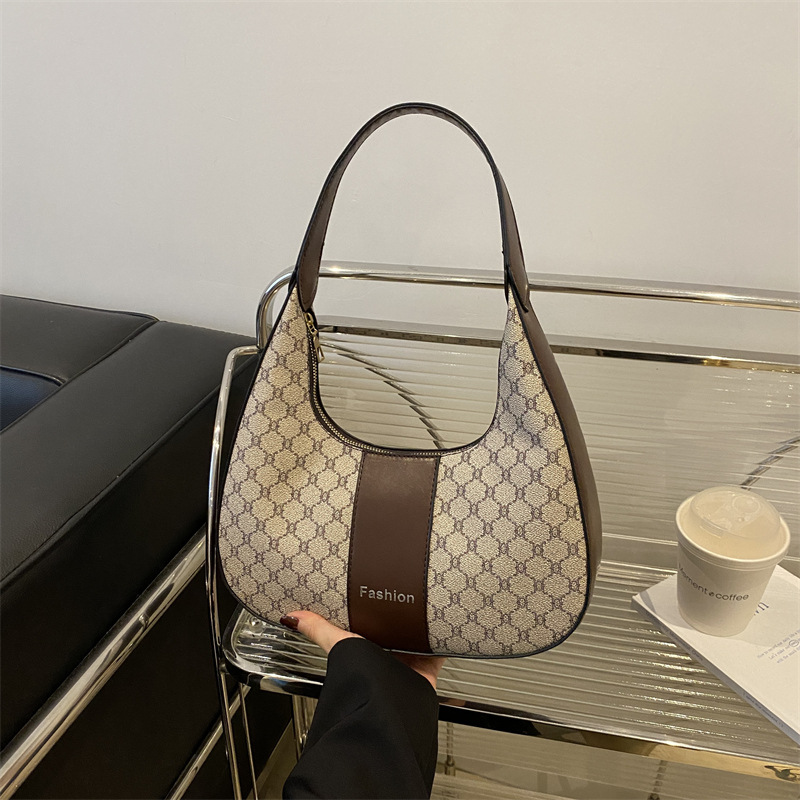 Arte y literatura color contrastante empalme viaje bolso de media luna portátil retro 2025 personalidad nueva moda braza de hombro bolso de mujer