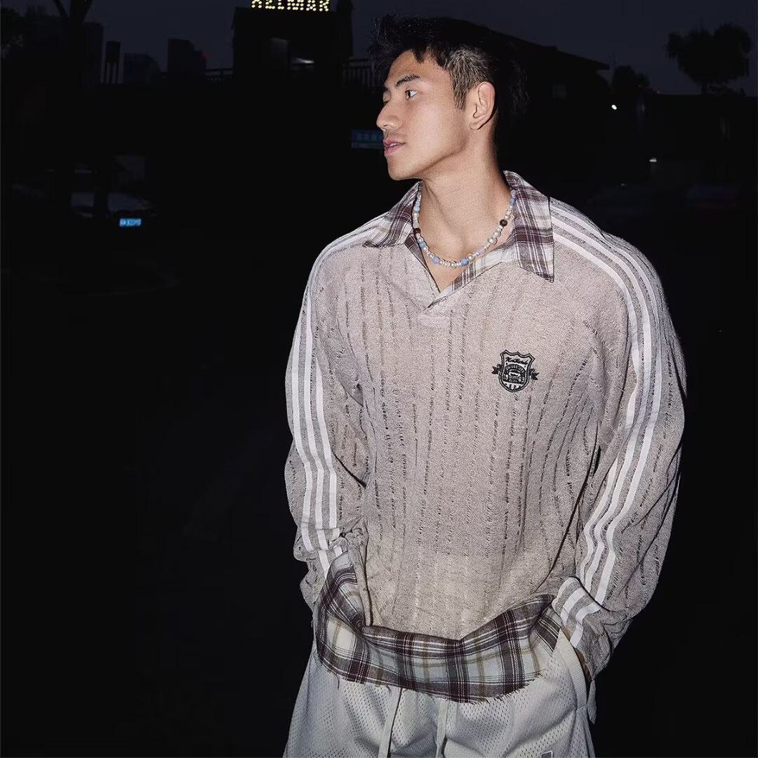 Otoño y invierno nuevo falso de dos piezas de manga larga hombre hueco polo camiseta con solapa cuadrilátero desgastado tela artesanal comercio exterior al por mayor transfronterizo