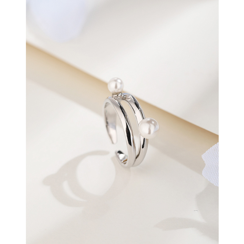 Anillo de perlas de plata esterlina 925 Luz de las mujeres nicho de lujo diseño avanzado anillo de cola ajustable abierto anillo de dedo índice