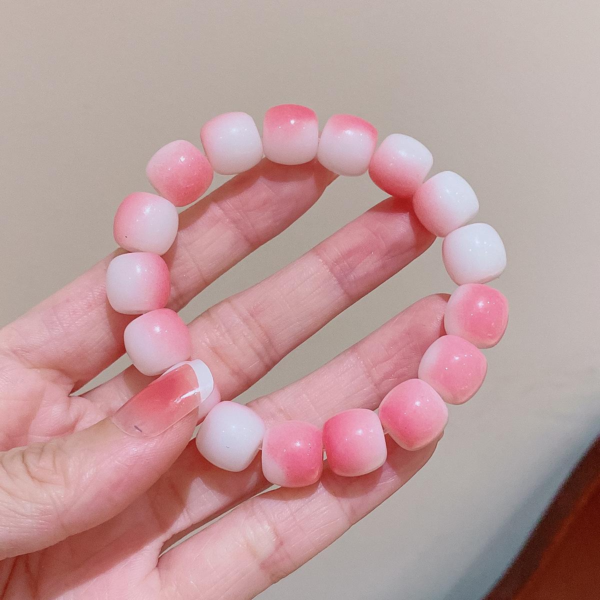 Tiktok mismo gradiente de color placa jugando pulsera estudiante partido dedo bobinado suave descompresión pulsera de cuentas Yiwu pequeña joyería al por mayor
