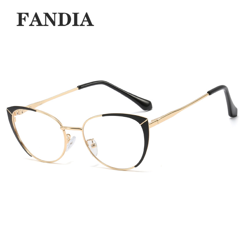95608 nuevo metal de moda gafas lisas marco redondo de los hombres y las mujeres anti-azul gafas de luz artística de dos colores gafas de Marco