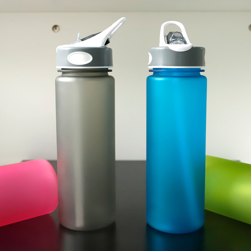 Taza espacial deportiva de alumno con paja de agua de plástico hervidor de agua de gran capacidad taza de agua al aire libre con mango al por mayor