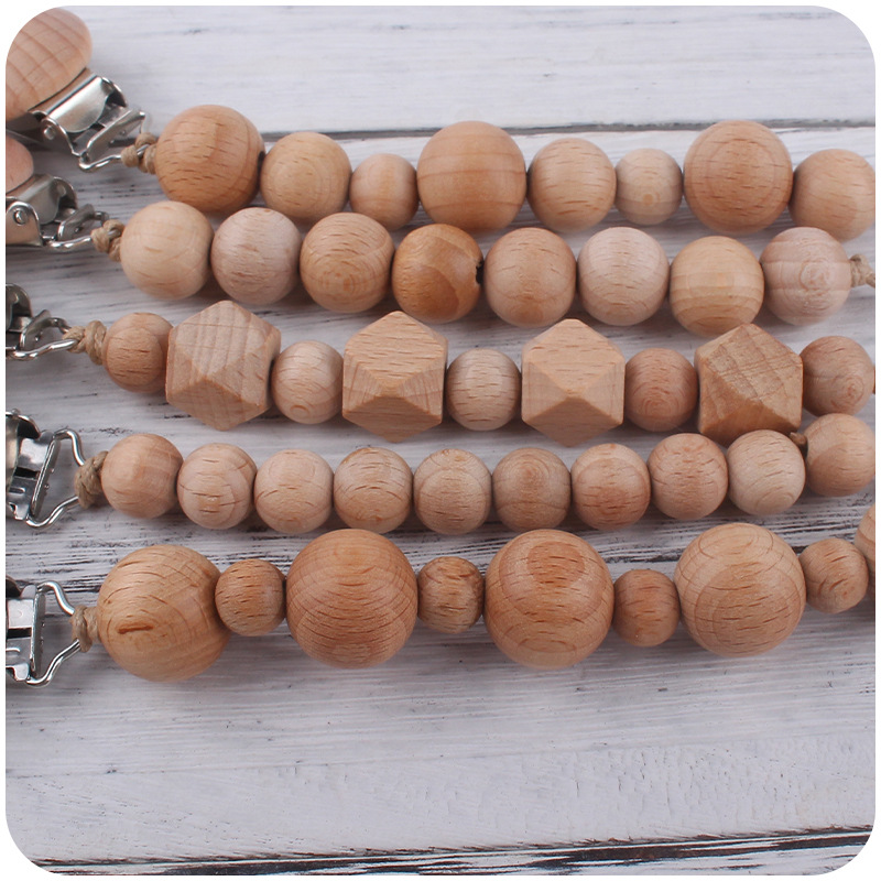 Nuevos suministros para bebés Beech clip calmante bebé Beech beads molar mordedura juguete anti-caída de la cadena Amazon