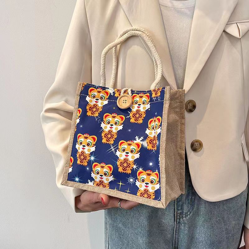 Algodón y lino Bento bolso bolsa para las mujeres 2022 Nuevo Tigre año de estilo occidental caja de almuerzo bolsa ins gran capacidad pequeña bolsa de hombro
