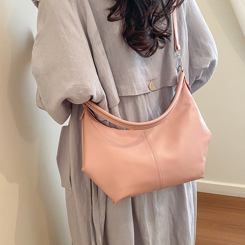 Bolso de brazo coreano para mujeres 2026 nuevo estilo sensación de verano popular bolso de hombro de viaje diario de gran capacidad bolso de tramo inclinado