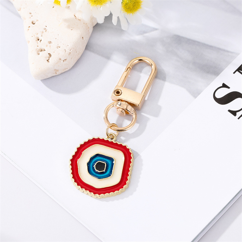 Simple Colorful Eyes Heart Keychain Alloy Irregular Round Bag Pendant Accessories display picture 2