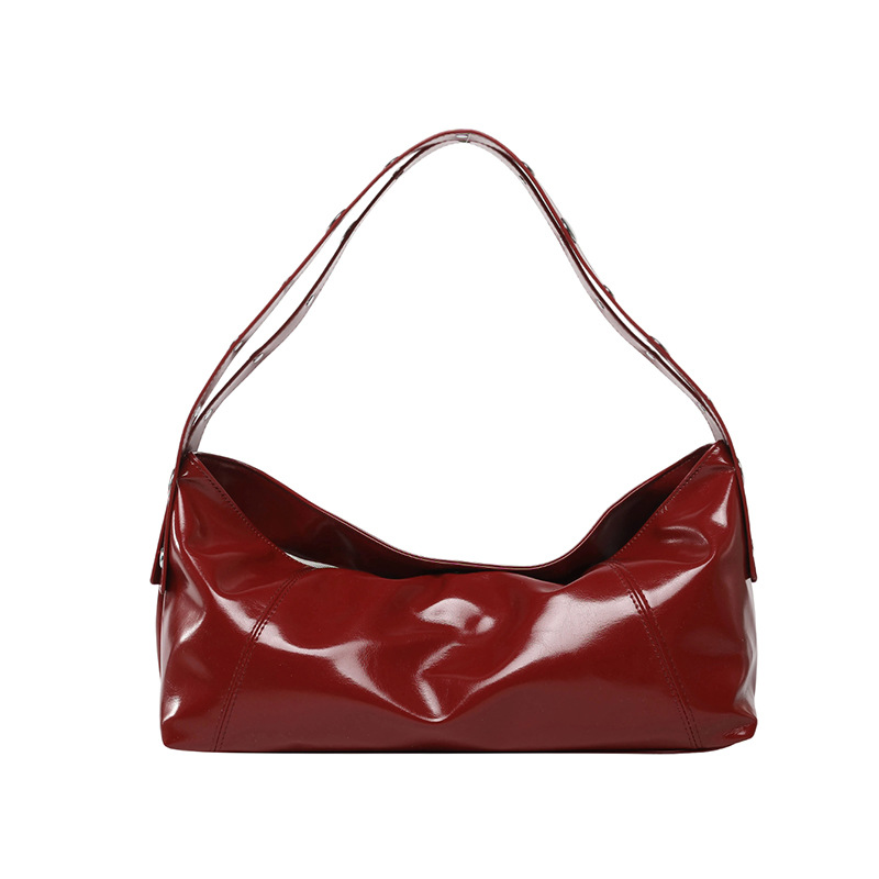 Bolso de axila retro estilo Hong Kong 2025 verano nuevo bolso femenino bolso de textura de alta calidad bolso de hombro con remaches de gran capacidad