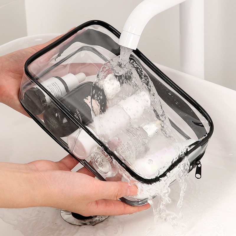 Bolsa de lavado conveniente de viaje de cuatro piezas, bolsa de maquillaje de PVC gruesa, bolsa de almacenamiento con cremallera a prueba de agua y polvo de gran capacidad
