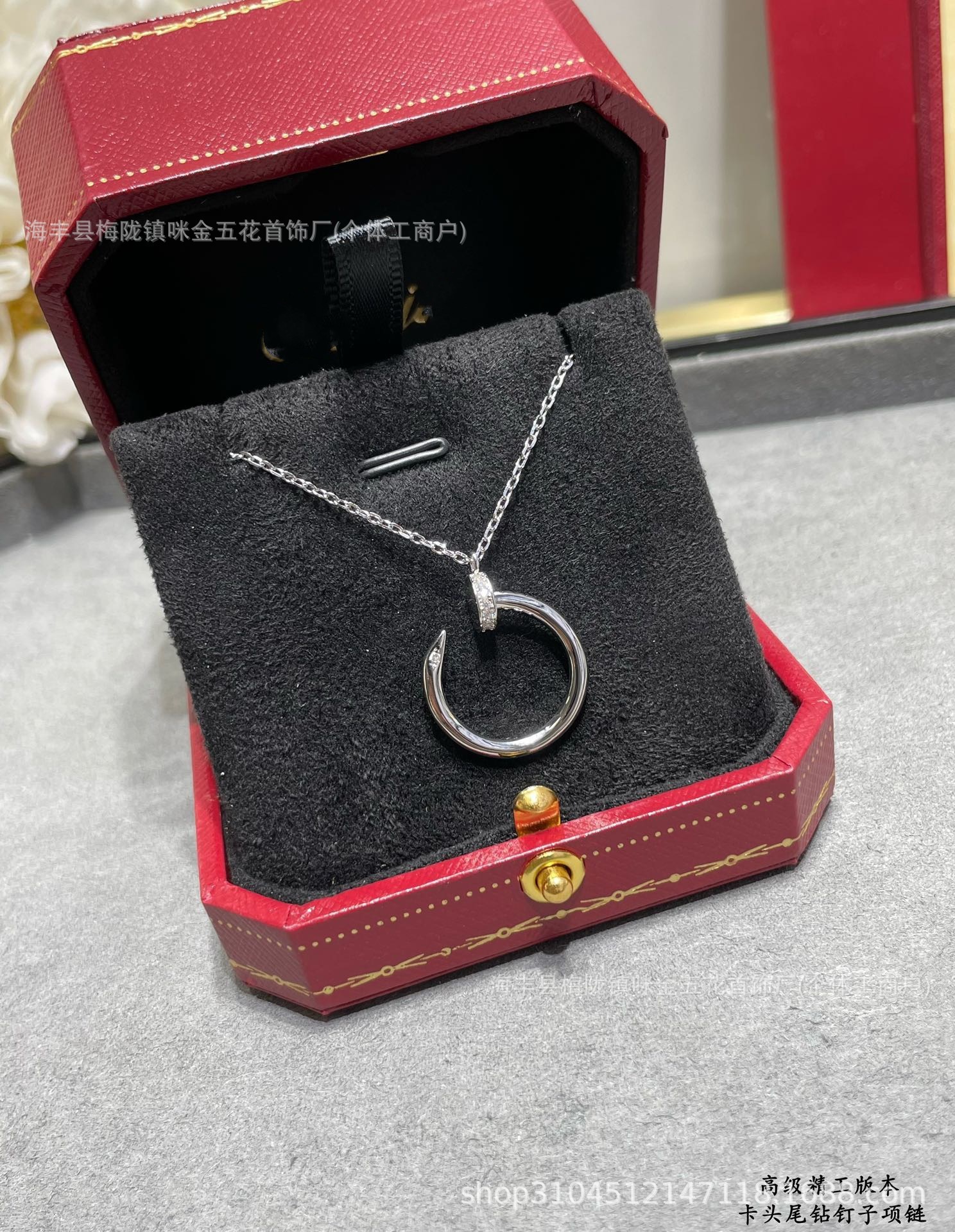 Platinum head and tail diamond nail necklace