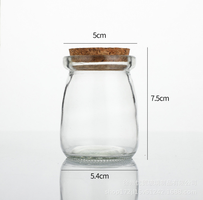 Venta al por mayor botella de pudín de vidrio de 100ml taza de leche gruesa botella de yogur resistente a altas temperaturas botella de vidrio de corcho