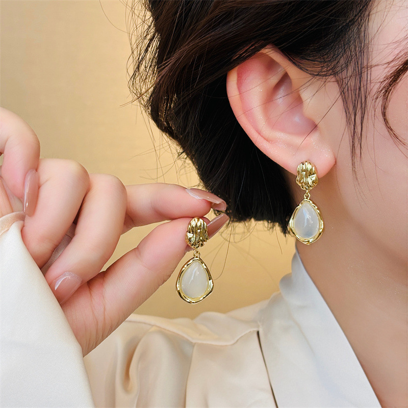 Fashionable elegant earrings drop-shaped