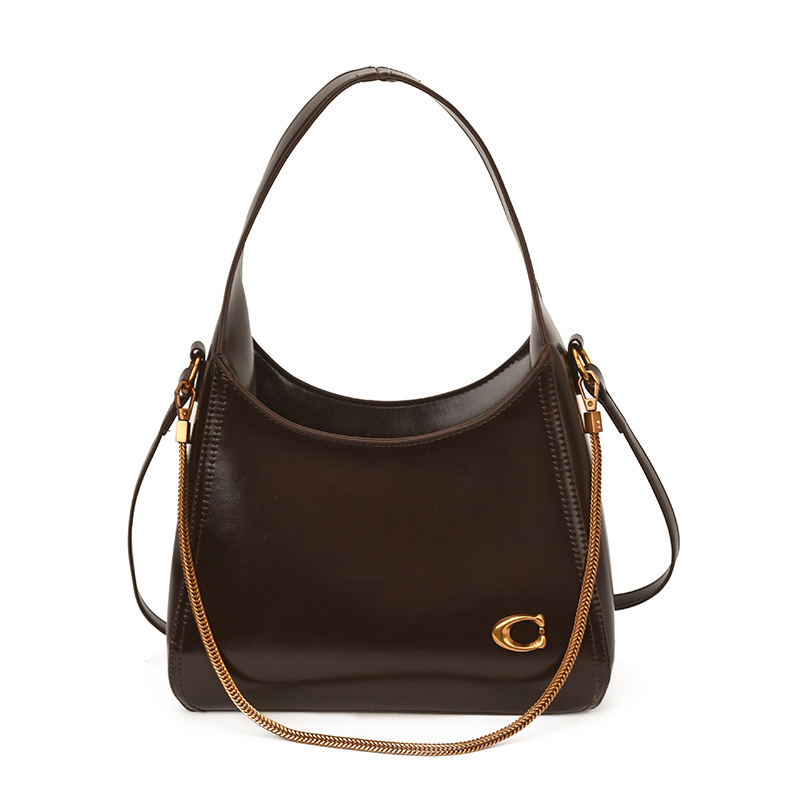 Bolsa de hombro Europa y América primavera y verano nuevo estilo perezoso bolso de brazo de viaje versátil de gran capacidad bolso de hombro de color sólido bolso de mujer
