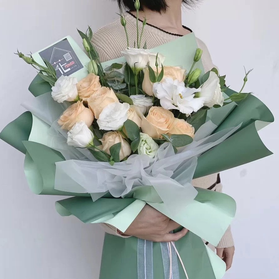 Lizhi Ran grueso bicolor impermeable Ouya papel embalaje de flores al por mayor color caramelo Hanfei papel 56cm rollo de doble cara