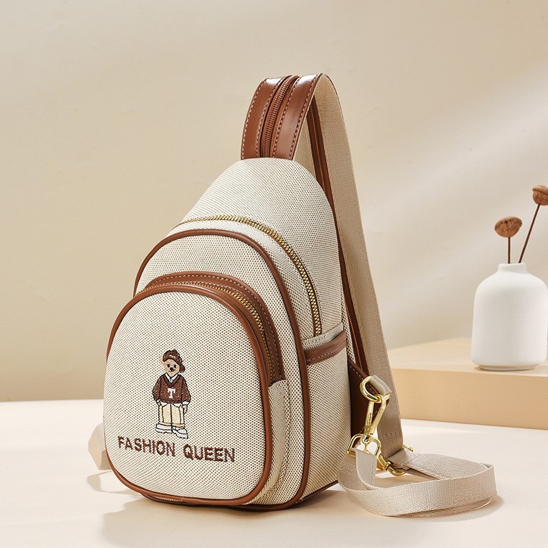 Mochila de dibujos animados 2025 nueva moda simple bolso de pecho casual mujer oso bordado bandolera de todo fósforo