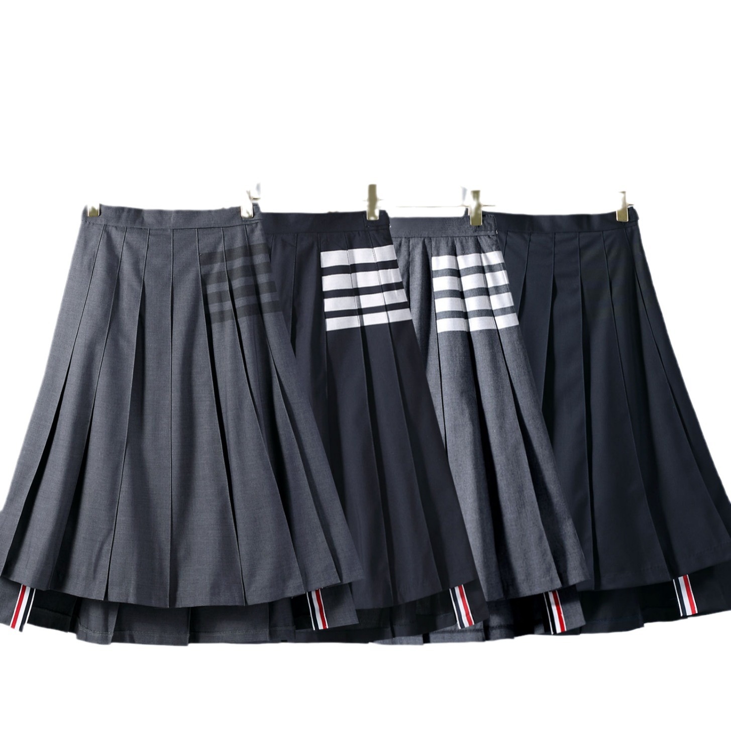 スポットTB JLプリーツスカート ハイウエスト 痩身 4本ストライプ アシンメトリーロングスカート Aライン 万能四季ハーフレングススカート レディース