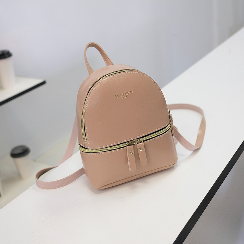 Bolso de mujer 2019 nuevo estilo aceite de cuero presión palabra mochila personalidad de la moda solo hombro pequeña mochila ventas directas de fábrica Moda